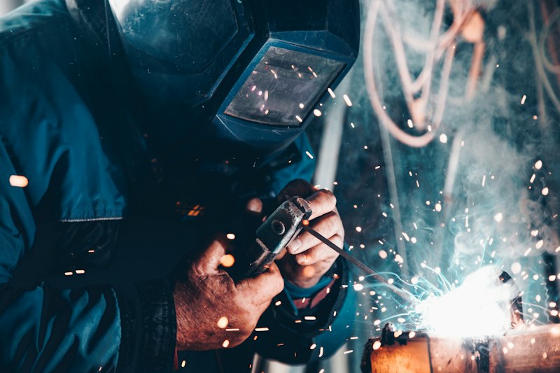 Illustrative industrial welders and metal fabrication - placeholder imagery